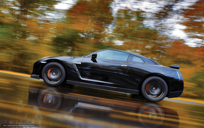 Black sports car in motion