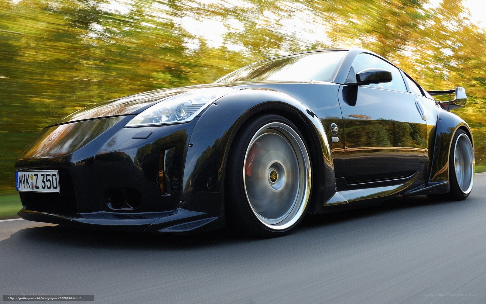 black sports car in motion