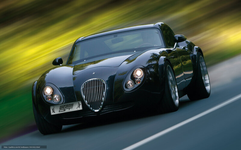 Black sports car in motion