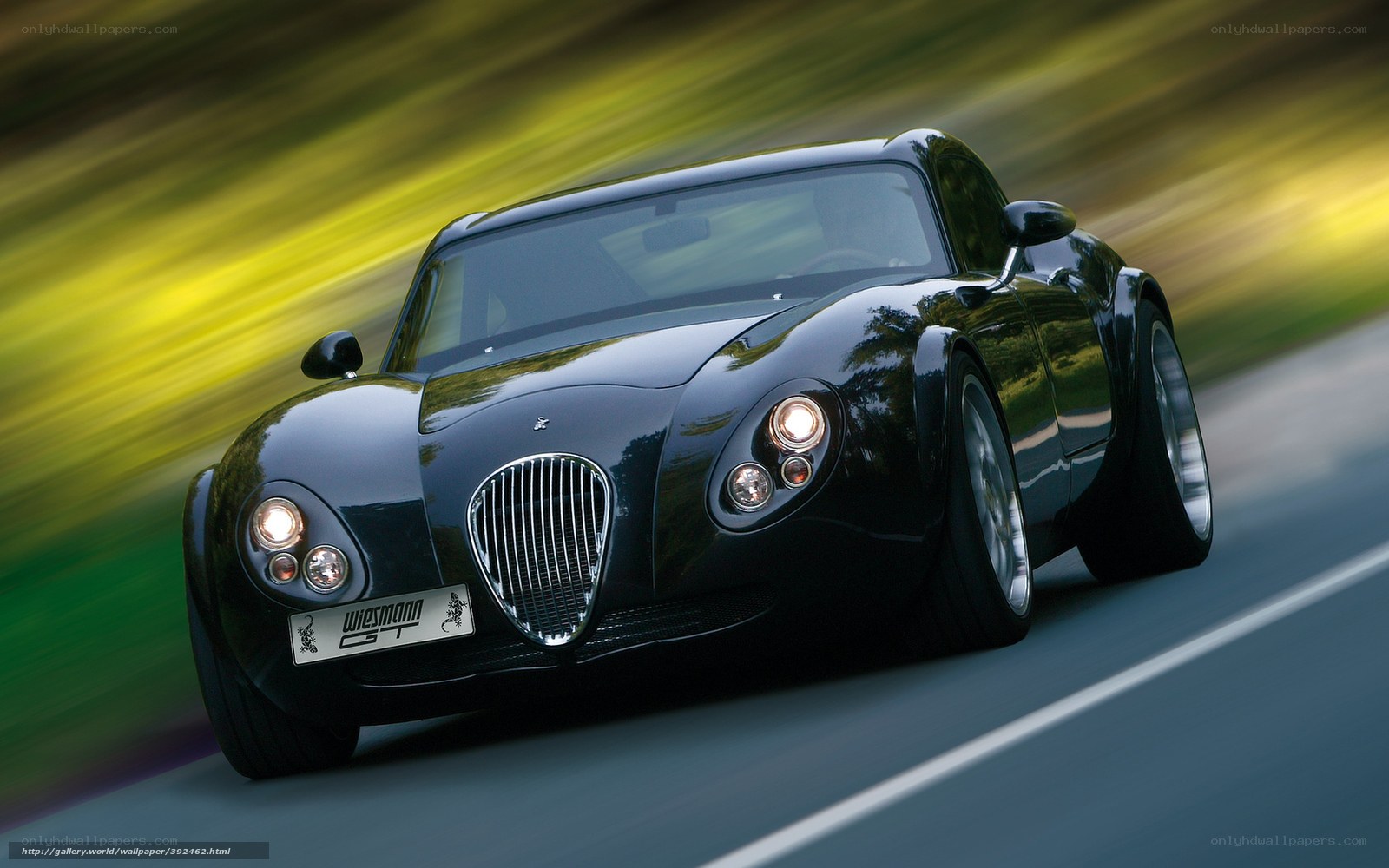 Black sports car in motion