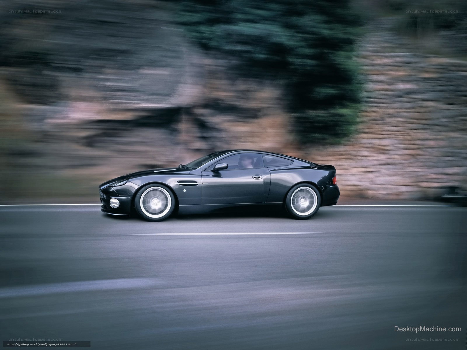 Black sports car in motion