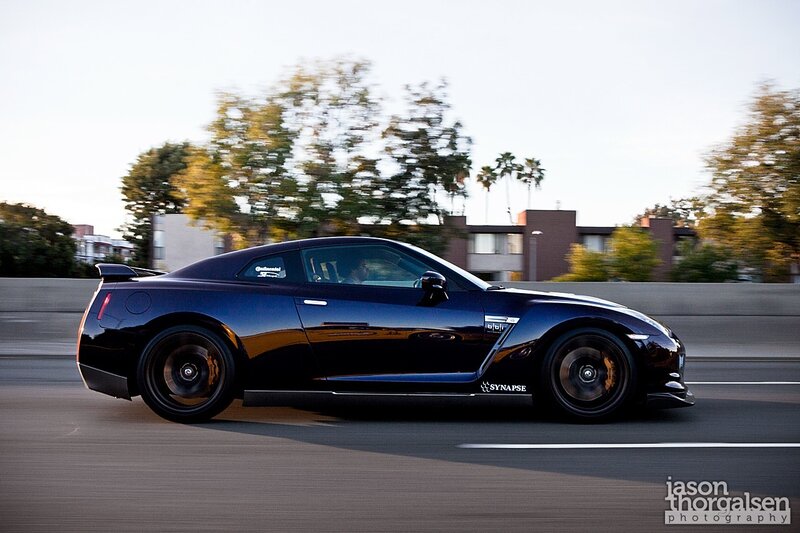 black sports car in motion