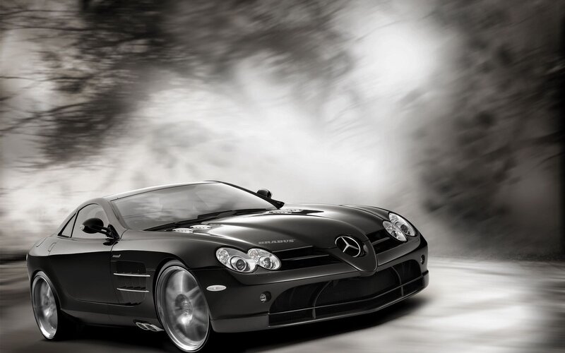Black sports car in motion