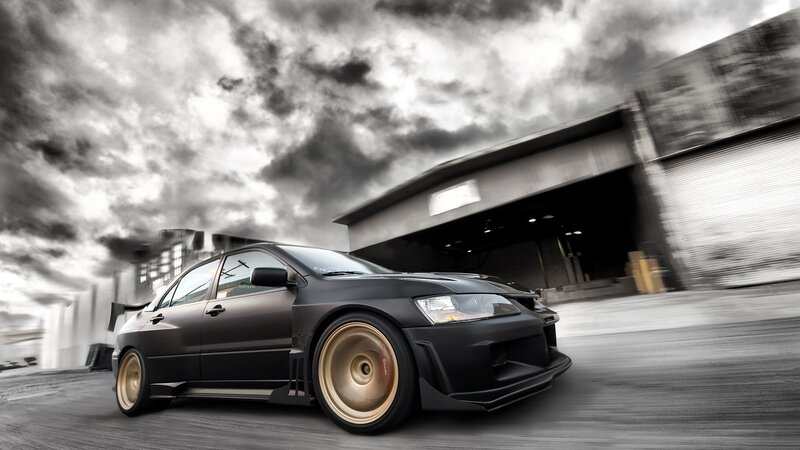 black sports car in motion
