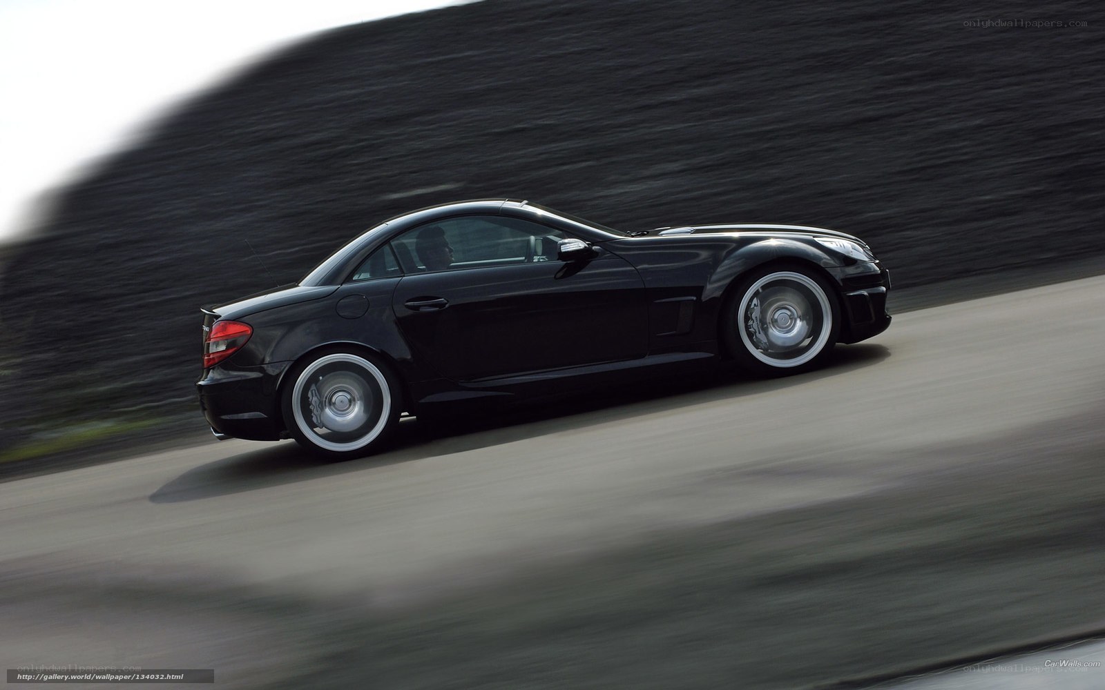 black sports car in motion