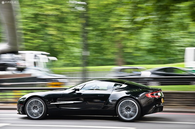 Black sports car in motion