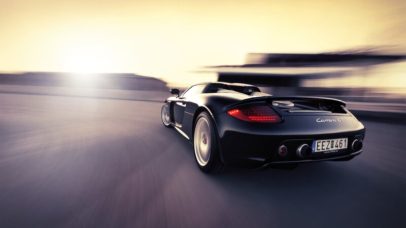 black sports car in motion