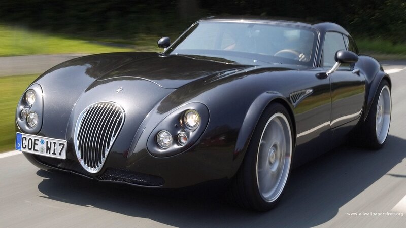 black sports car in motion