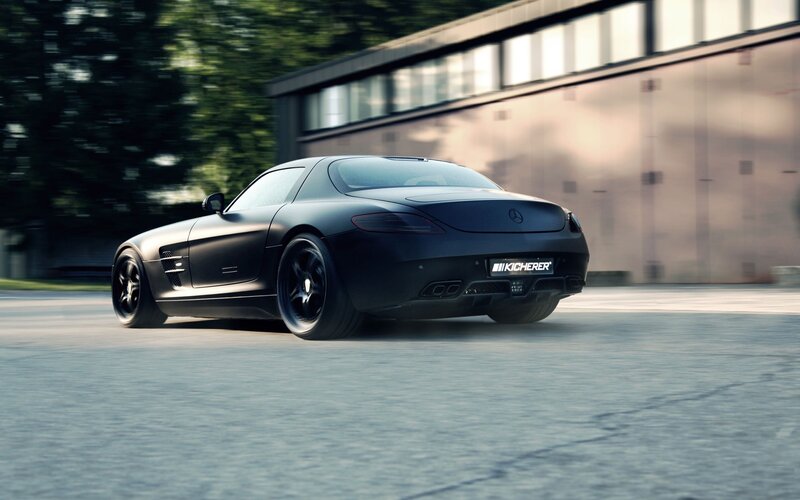 black sports car in motion