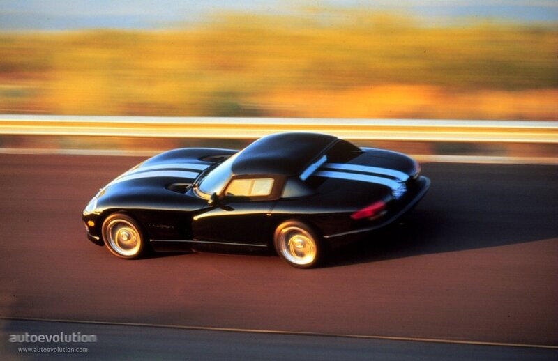 Black sports car in motion