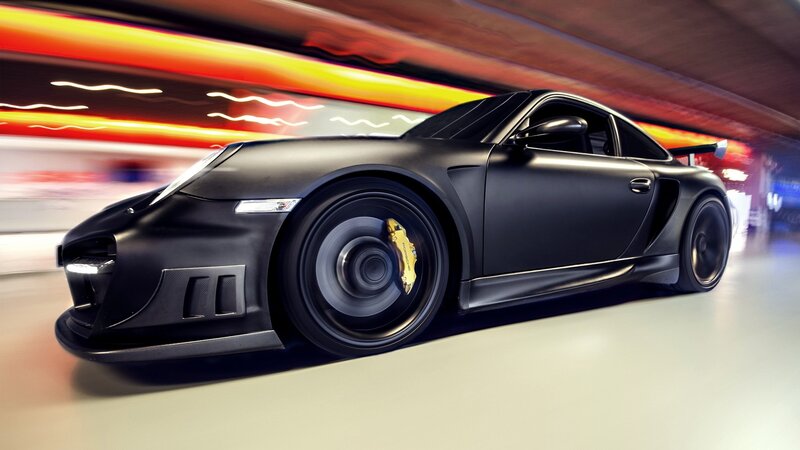 black sports car in motion