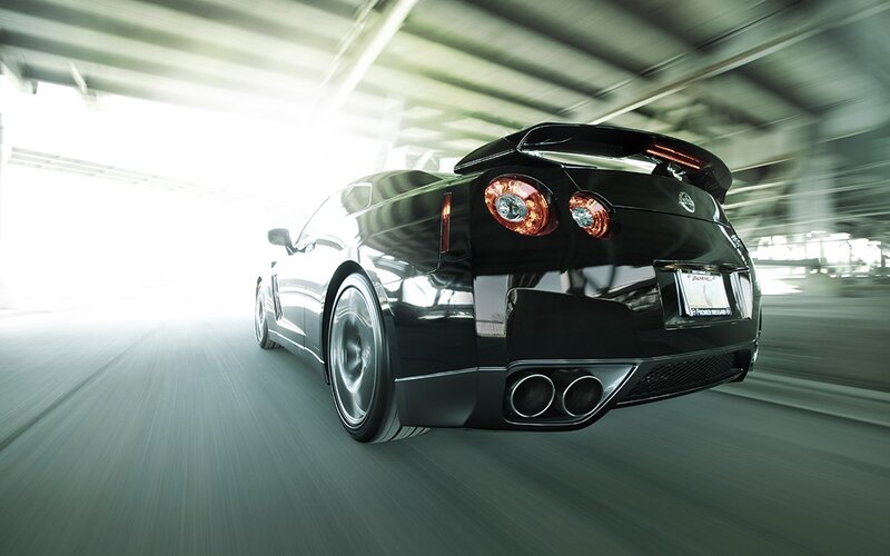 black sports car in motion