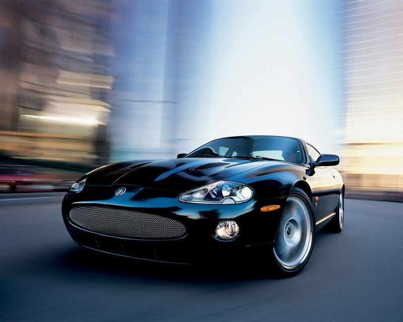 Black sports car in motion