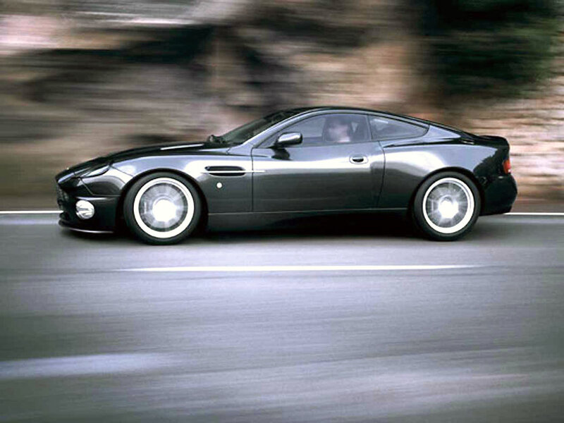 black sports car in motion