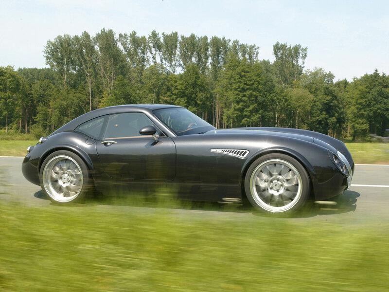 black sports car in motion