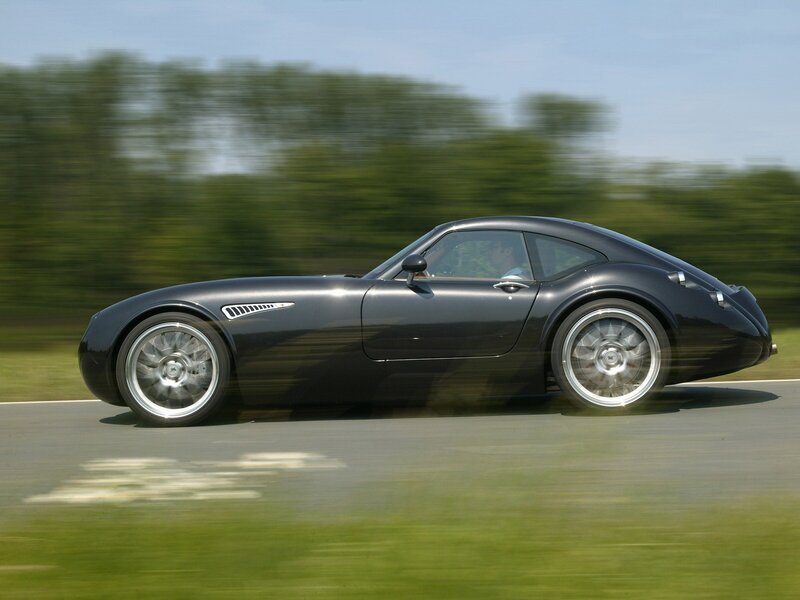 black sports car in motion