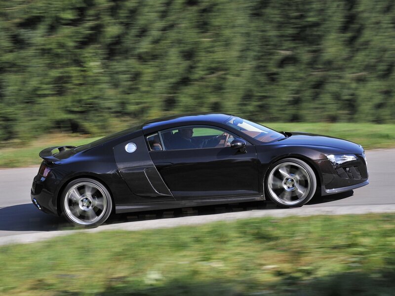black sports car in motion