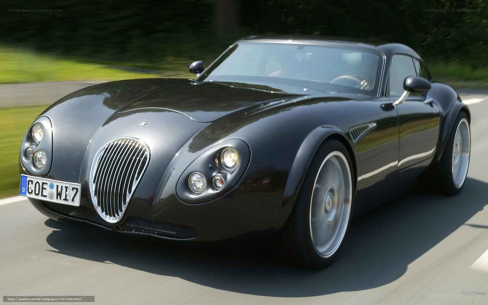 black sports car in motion