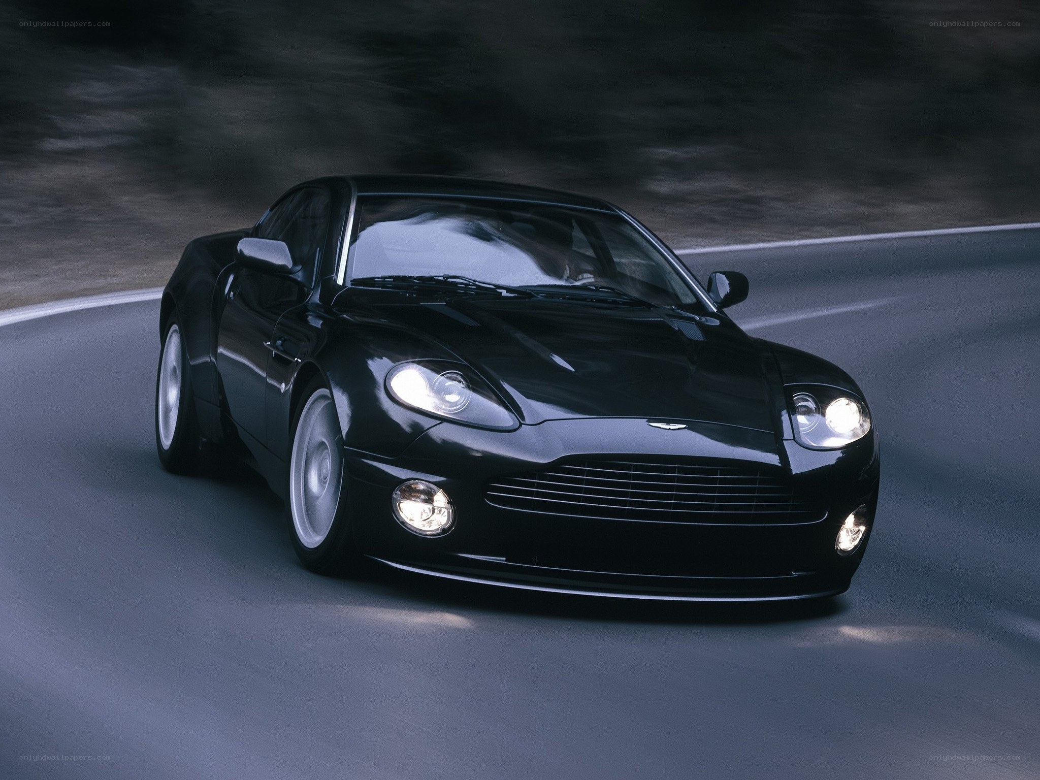 black sports car in motion