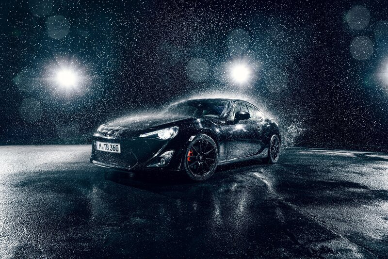 Black Sports Car in Rain — Dramatic, Night
