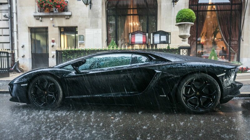 Black Sports Car in Rain — Dramatic, Photograph