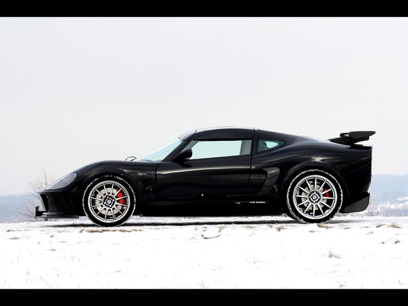 Black sports car in snow