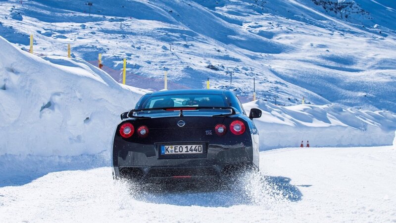 Black Sports Car in Snow — White