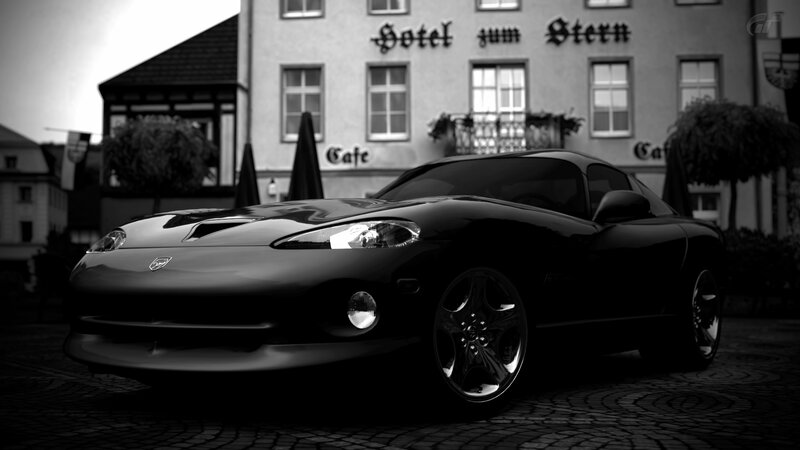 black sports car in town