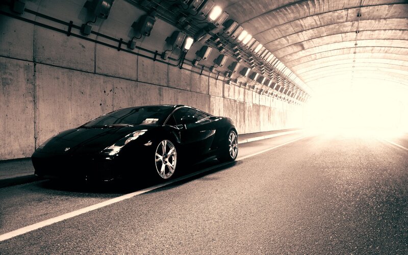 Black sports car in tunnel