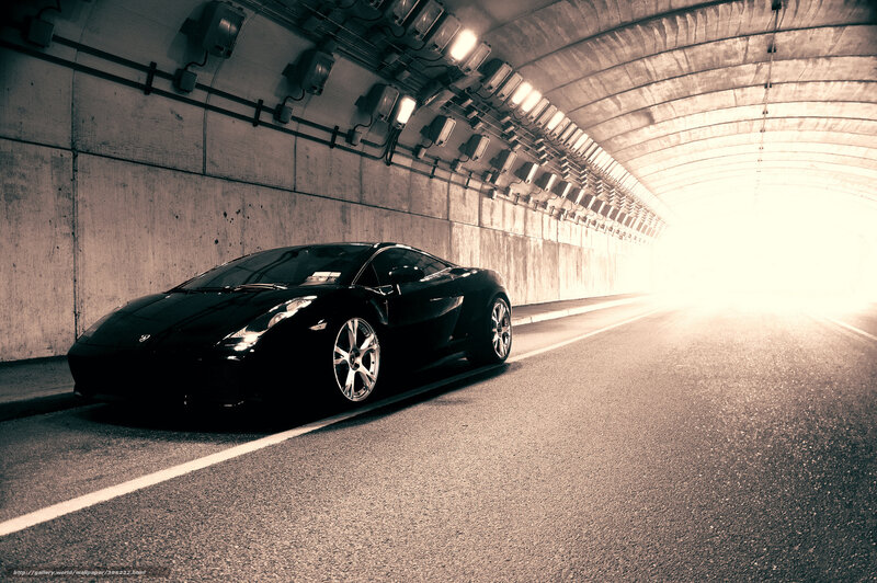 Black sports car in tunnel