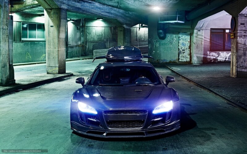 Black sports car in underground garage