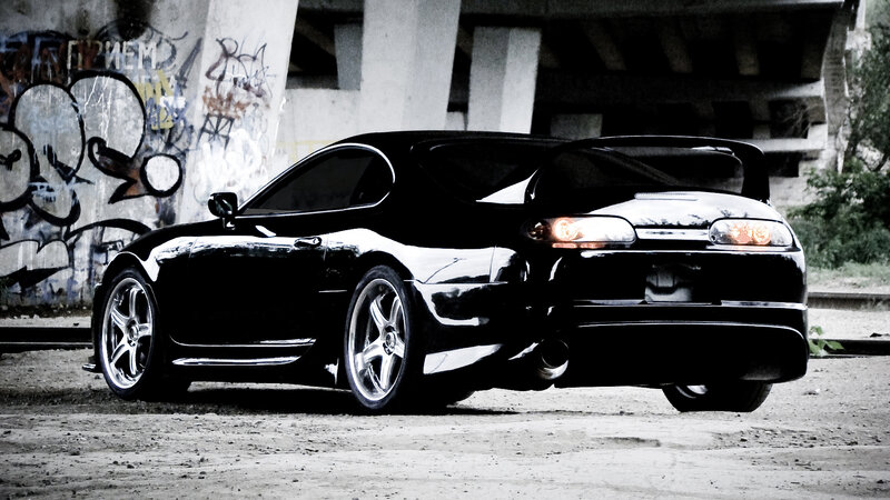 black sports car in urban setting