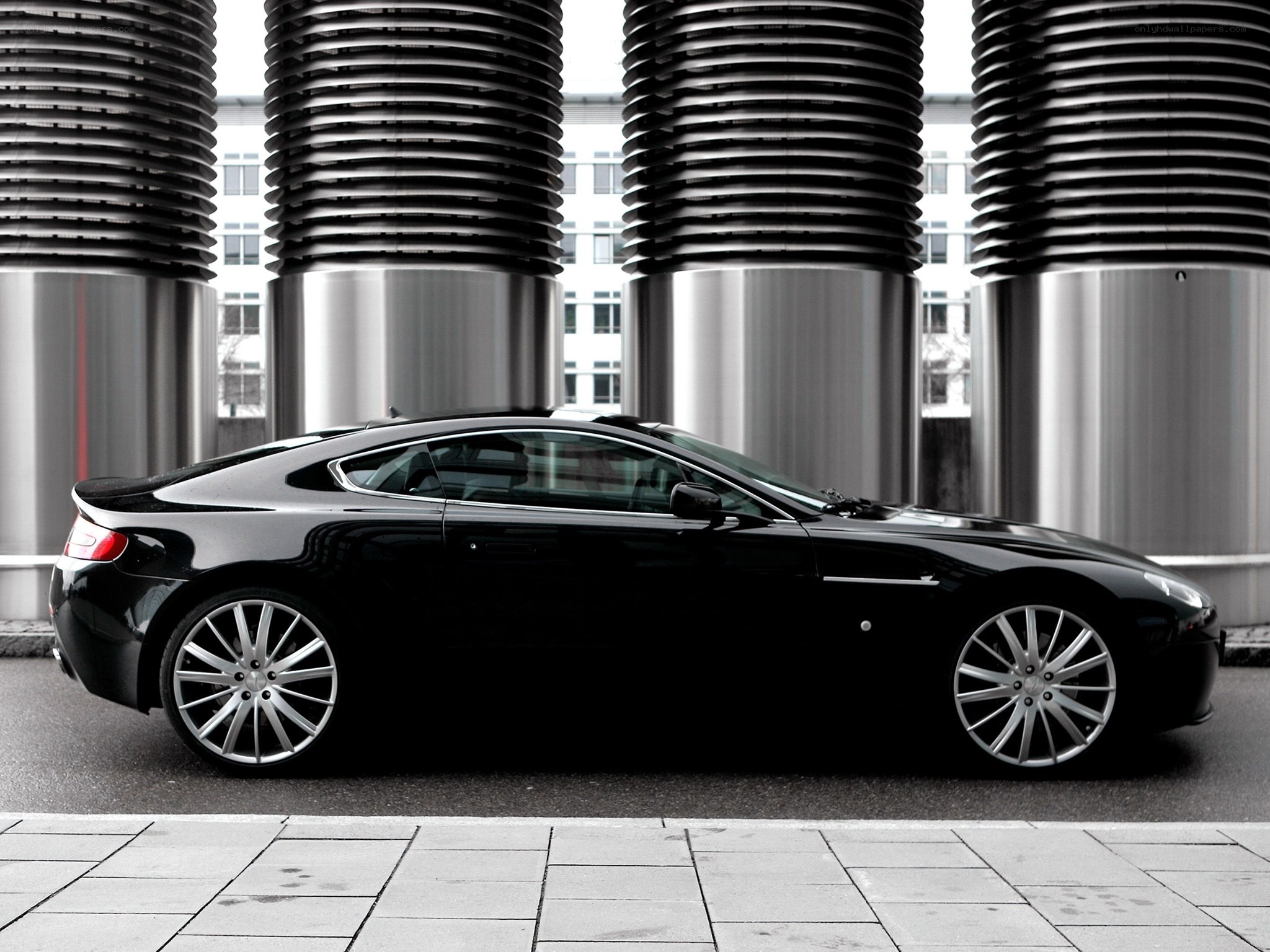 Black sports car in urban setting