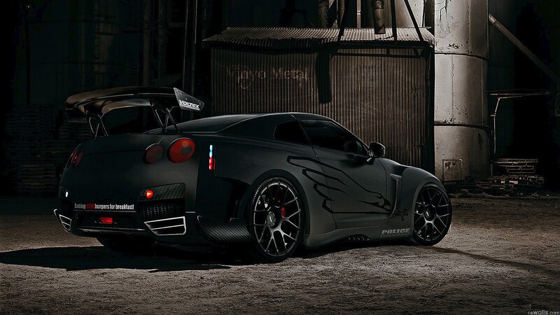 black sports car in warehouse