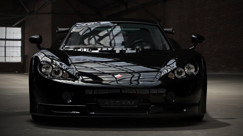 black sports car in warehouse