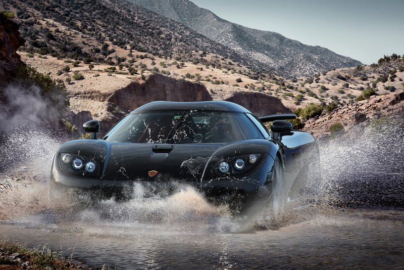 Black sports car in water