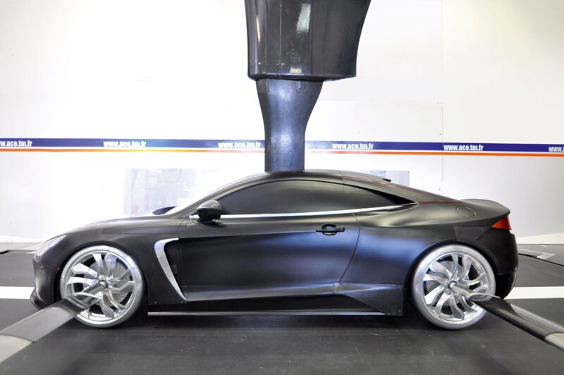 black sports car in wind tunnel