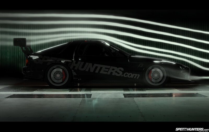 black sports car in wind tunnel