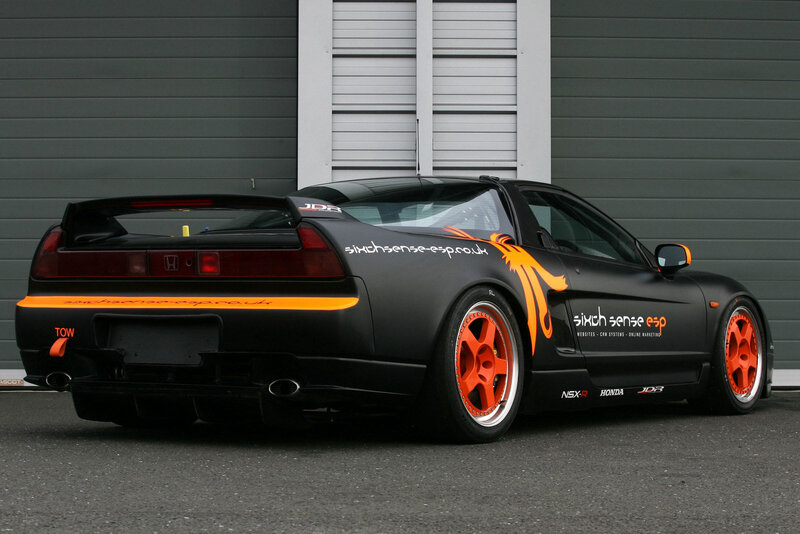 Black Sports Car — Neutral, Photograph, Tow Hook