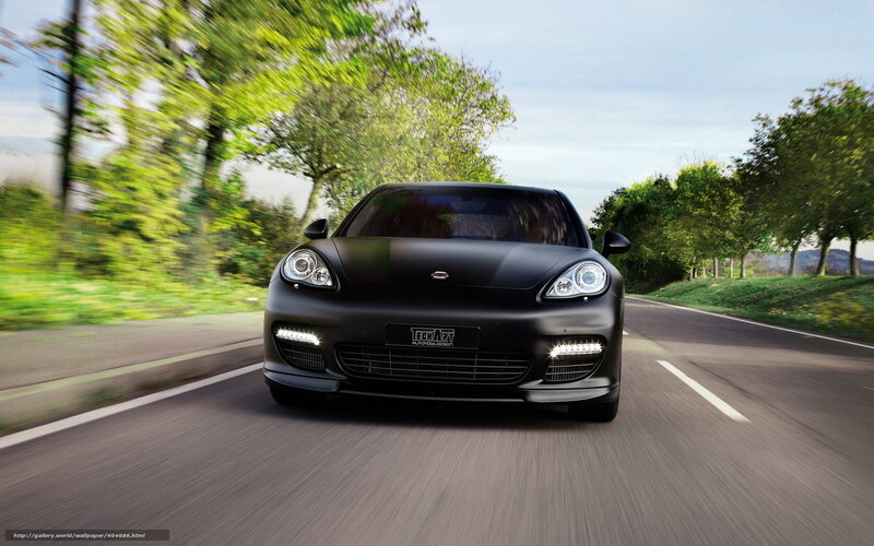 Black sports car on a country road