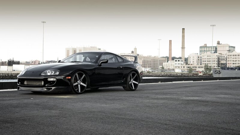 black sports car on a pier