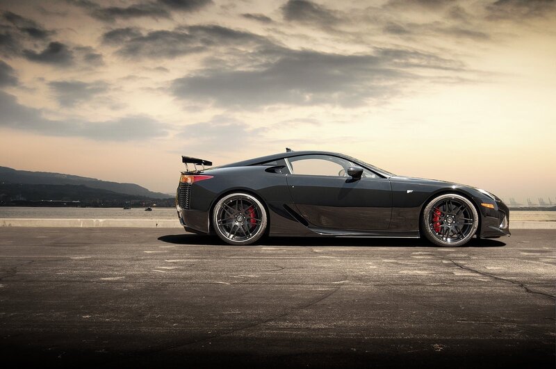 Black sports car on a pier