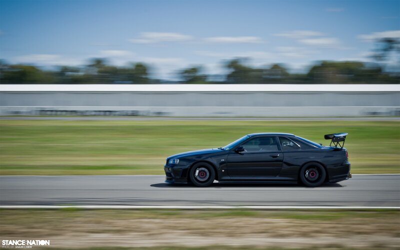 Black sports car on a racetrack
