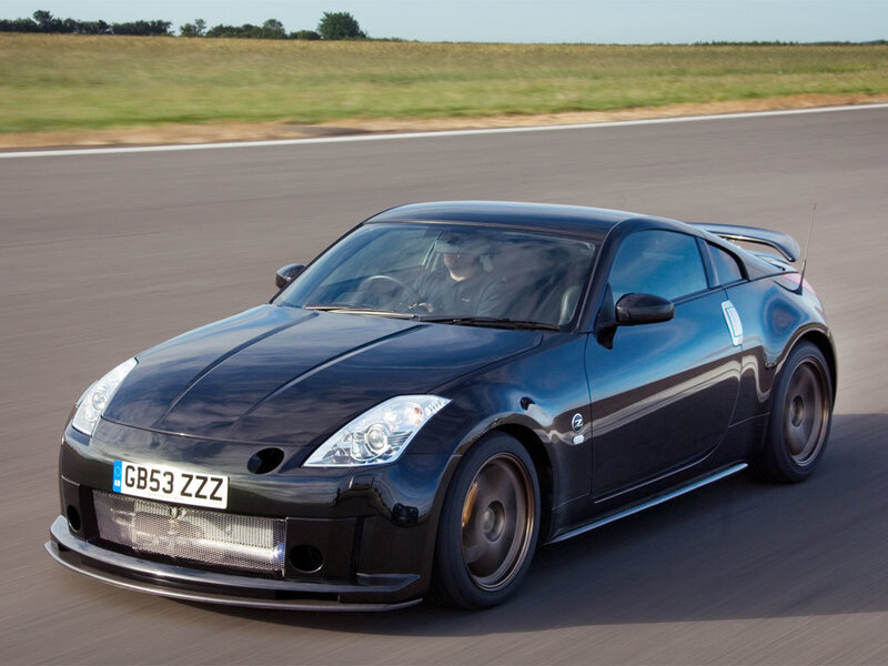 Black sports car on a racetrack
