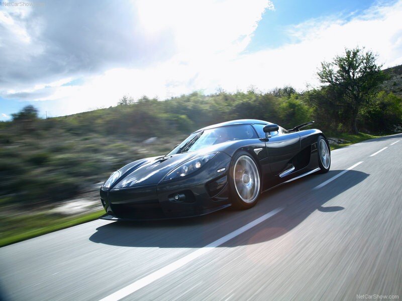 black sports car on a road