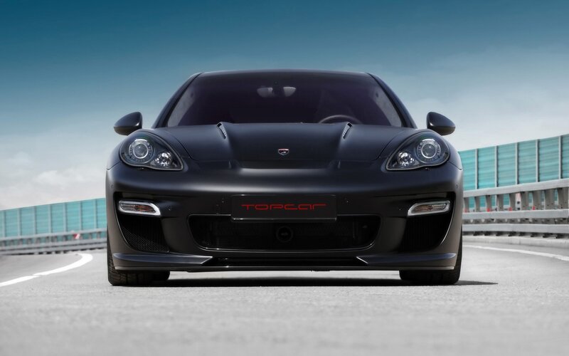 black sports car on a road
