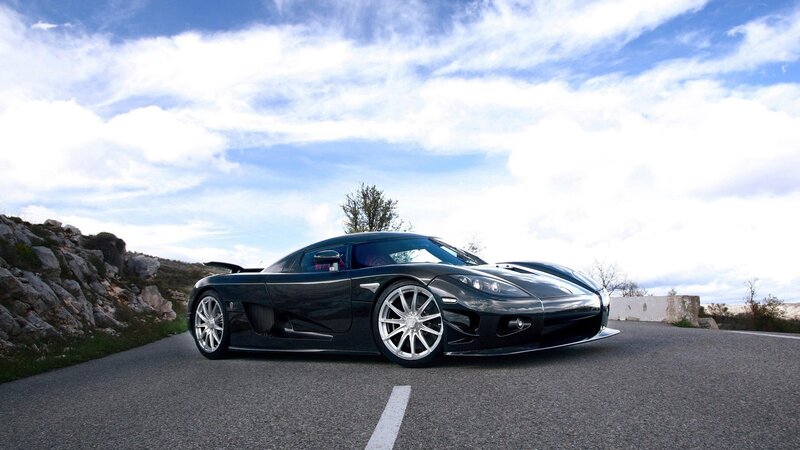 black sports car on a road