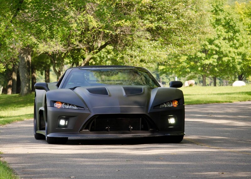 black sports car on a road