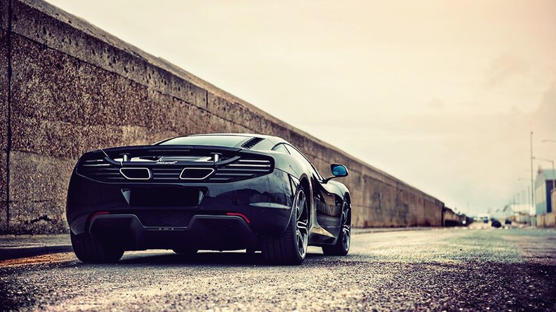black sports car on a road
