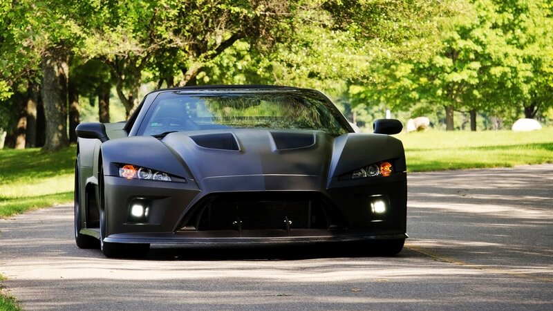 black sports car on a road